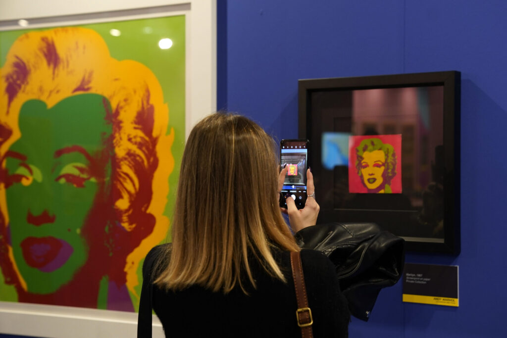 Can AI Tell Us How Much to Pay for Art?