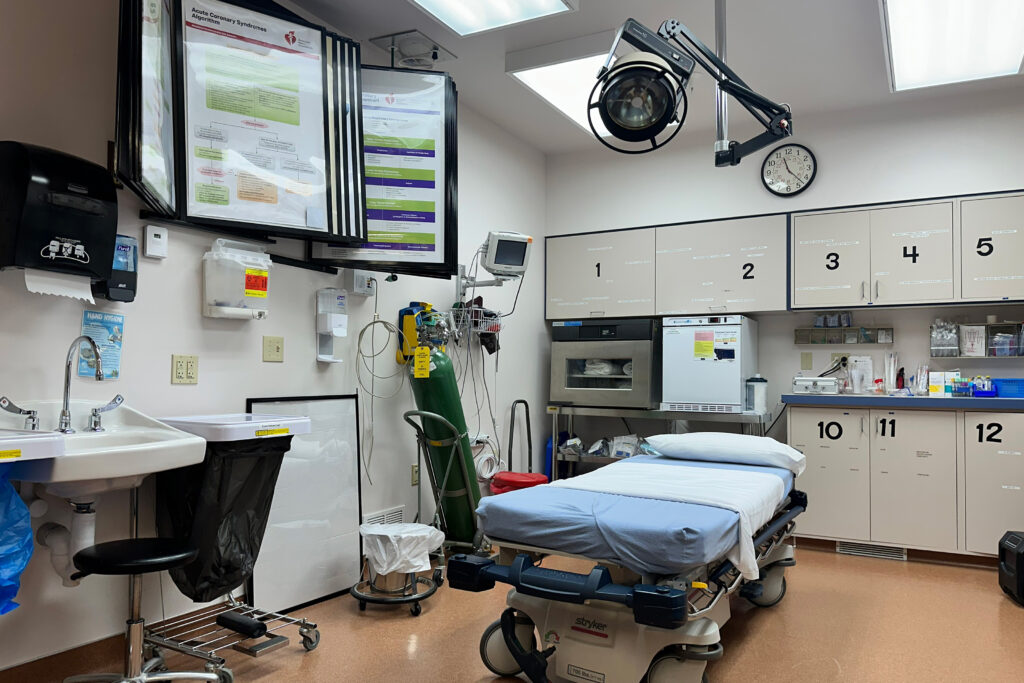 Give and Take: Federal Rural Health Funding Could Trigger Service Cuts A photo of a small emergency room. Only one bed is visible.